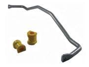 Whiteline BBF36X 24 mm sway bar in silver metal with heavy-duty blade design, accompanied by two yellow polyurethane bushings.
