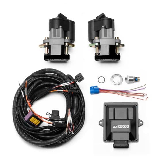 Black electronic parking brake rear retrofit brake kit by Wilwood, featuring two motors, wiring harness, and control module, designed for enhanced braking performance.