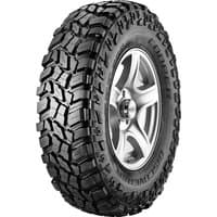 Cooper Discoverer STT PRO tire with aggressive tread pattern, black sidewalls, and visible silver alloy wheel.