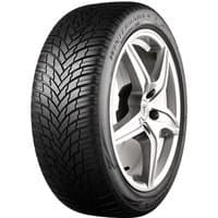 Firestone Winterhawk 4 tire, 235/50 R18, black with V-shaped tread pattern and silver alloy wheel rim.