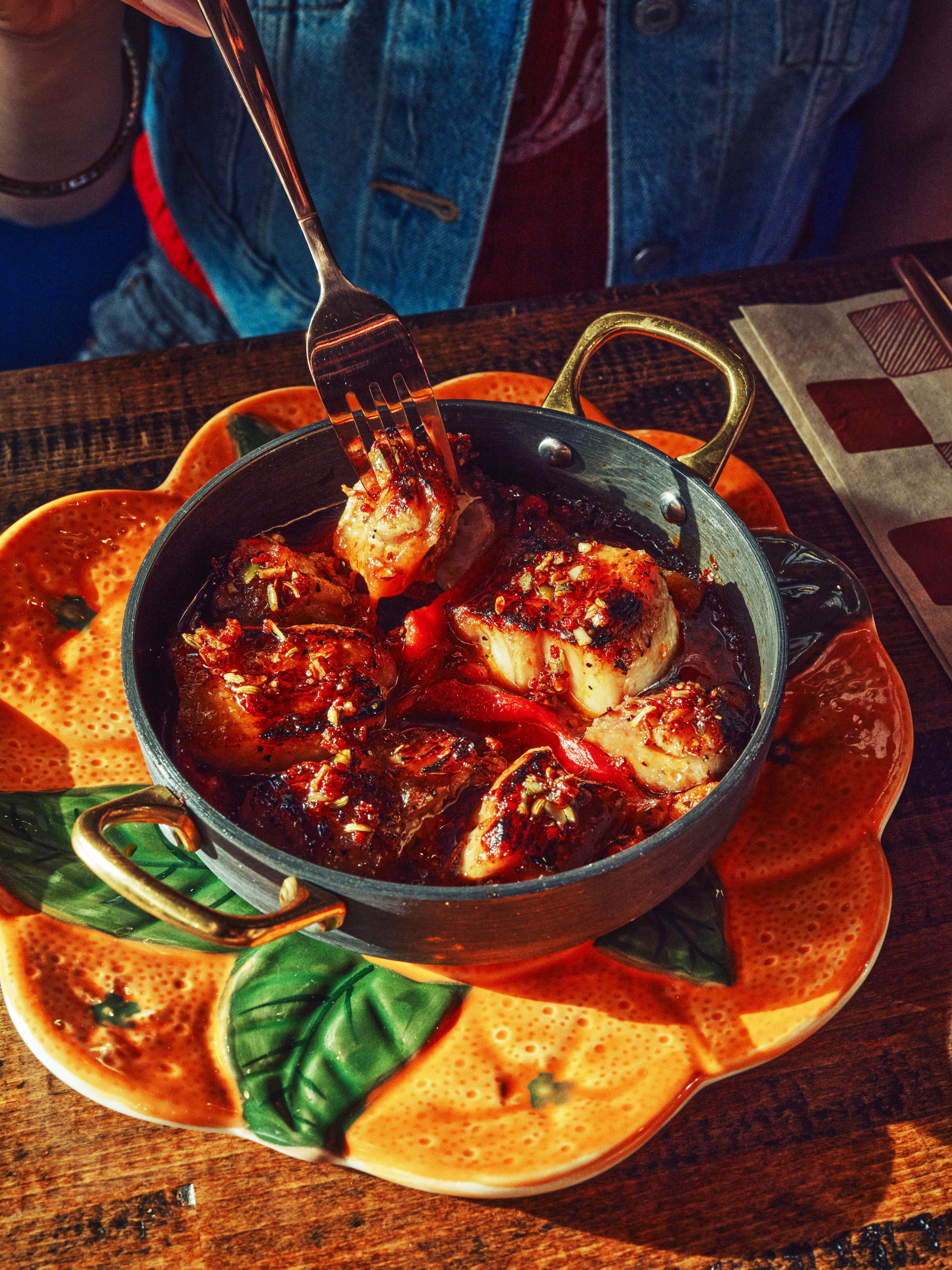 Zizzi dish with grilled meat in sauce