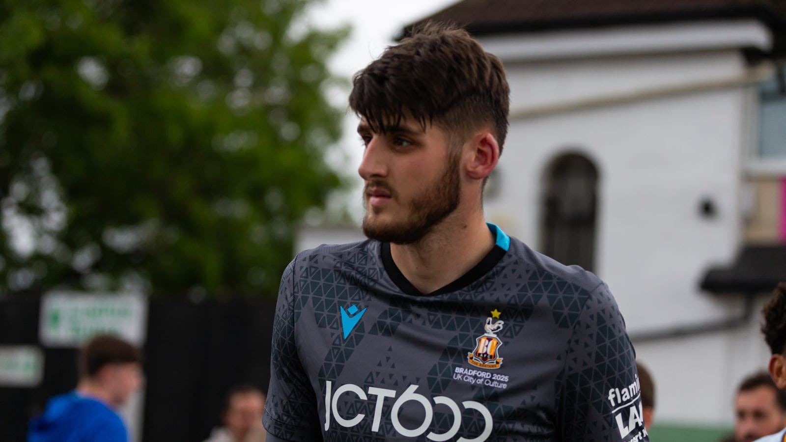 Zac Hadi goalkeeper in sports jersey at Bradford city event