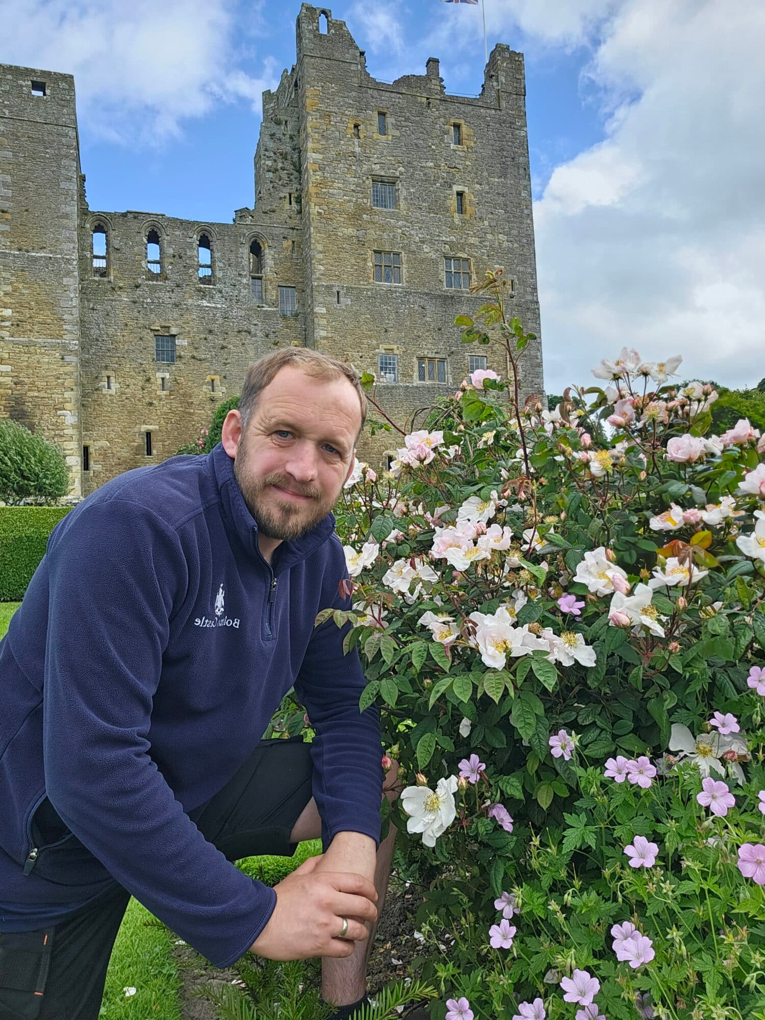 Jason Hanslip with roses at Bolton Castle