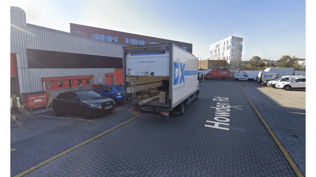 Pay & Display parking area in Attercliffe, Yorkshire, with a delivery truck and several parked vehicles.