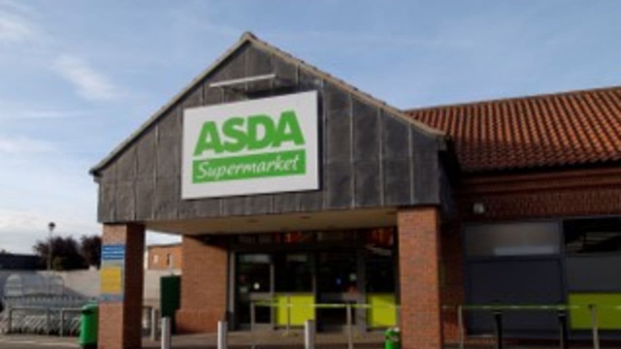Exterior of Asda Supermarket in Beverley, Yorkshire, featuring a large green sign and brick facade.