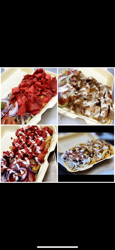 Four trays of loaded fries topped with various meats, onions, and sauces, from Pizza 55 in Birstall, Yorkshire.