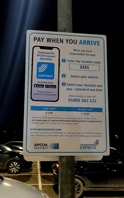 Pay & Display sign for Car Park Brough with instructions for using the APCOA Connect app and contact information.