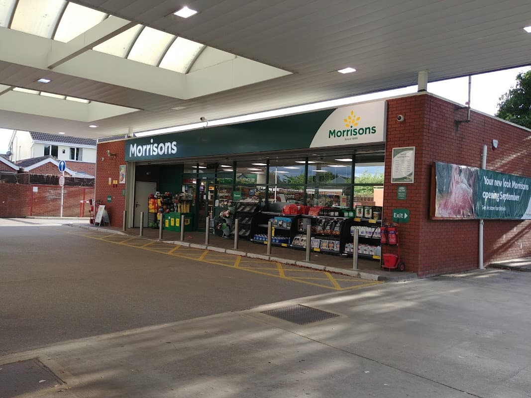 Morrisons store exterior in Brough, Yorkshire, featuring large windows and a green and white sign.