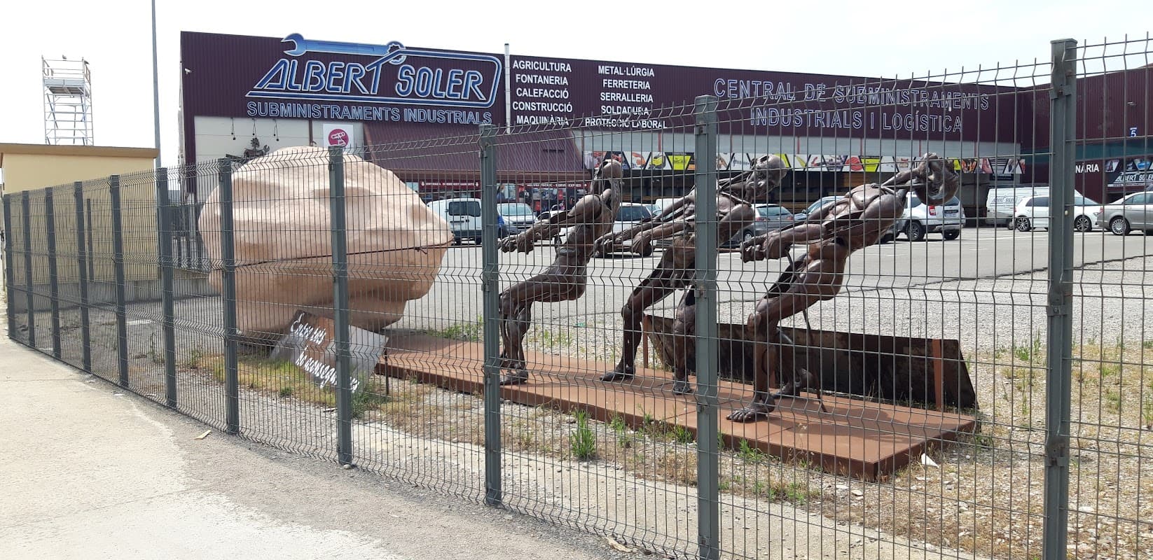 Sands Lane Coach and Lorry Park with parked vehicles and a Pay & Display sign in Dewsbury, Yorkshire.
