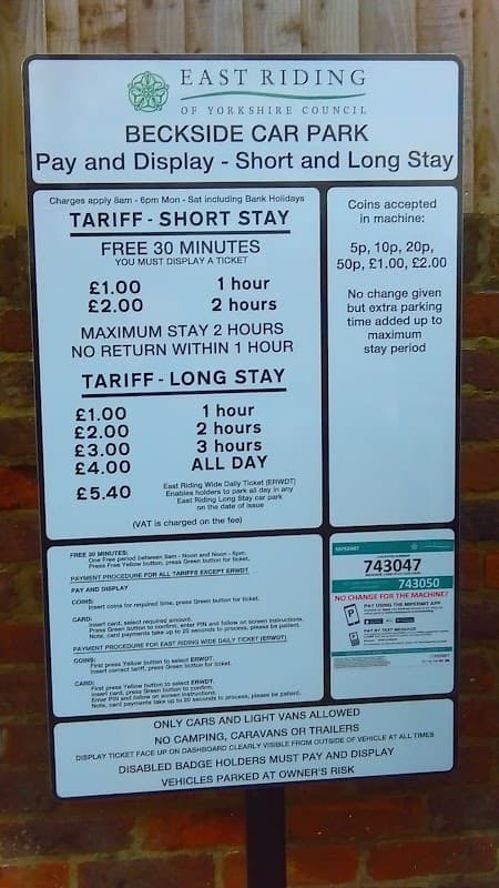 Sign detailing parking tariffs for Beckside Car Park in Driffield, including short and long stay options and prices.