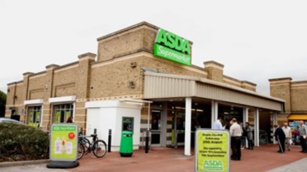 Asda supermarket building with green signage, entrance, and shoppers outside in Goole, Yorkshire.