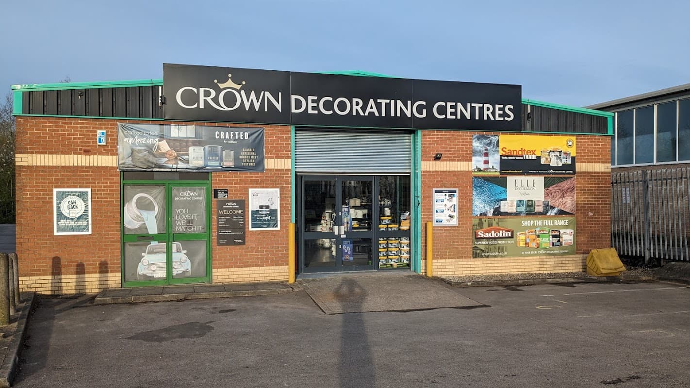 Crown Decorating Centre storefront with signage, product displays, and a paved entrance in Harrogate, Yorkshire.