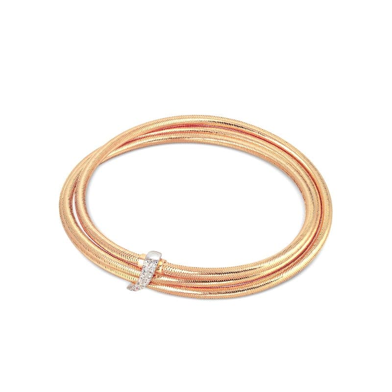 Elegant gold and rose gold twisted bracelet with a diamond accent, displayed on a white background.