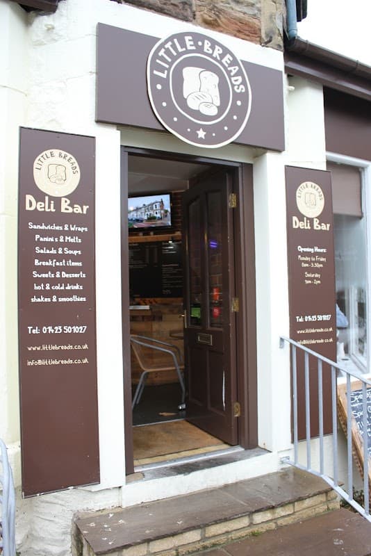 Signage for "Little Breads" bakery featuring a logo, menu items, and contact information in Harrogate, Yorkshire.