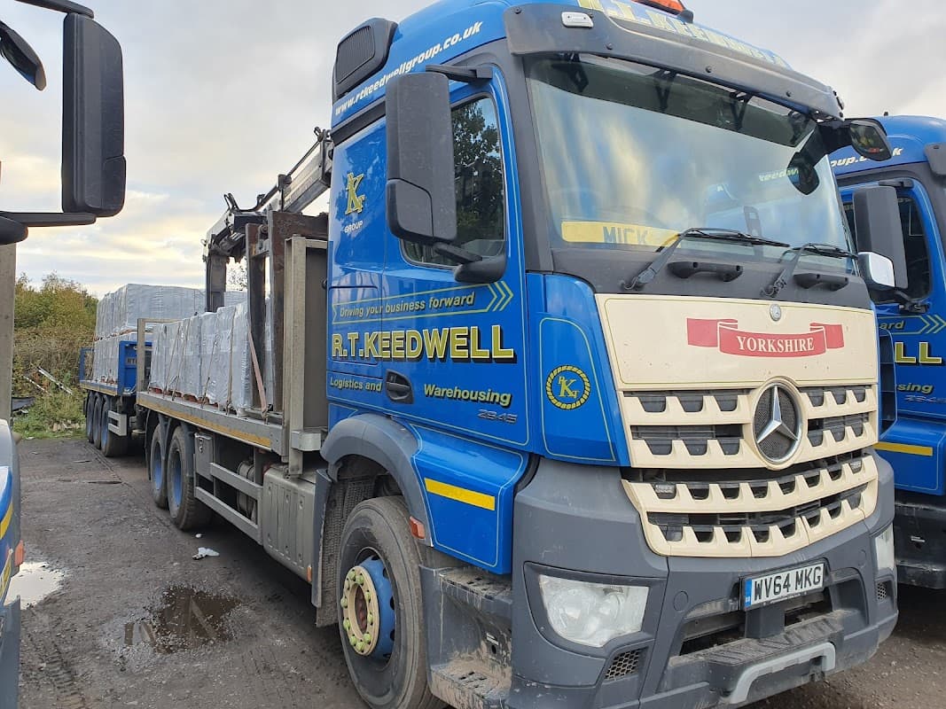 R.T. Keedwell truck parked with cargo, featuring blue and yellow branding, in Hensall, North Yorkshire.