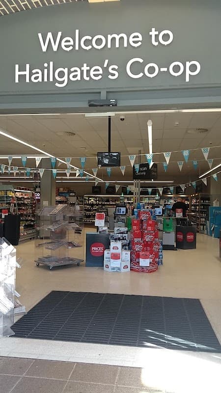 Welcome to Hailgate's Co-op; entrance with banners, shopping aisles, and promotional displays visible inside.