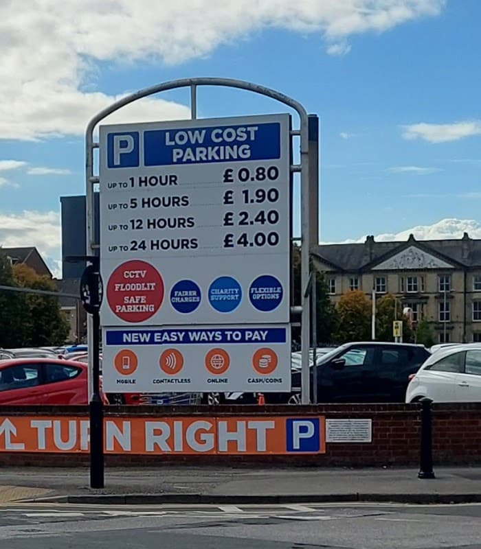 Sign displaying parking rates and payment options at St Stephens Square Car Park in Hull, Yorkshire.