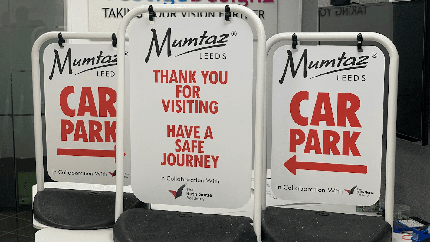 Three signs for Mumtaz Leeds Car Park, displaying "Thank You for Visiting" and directional arrows.