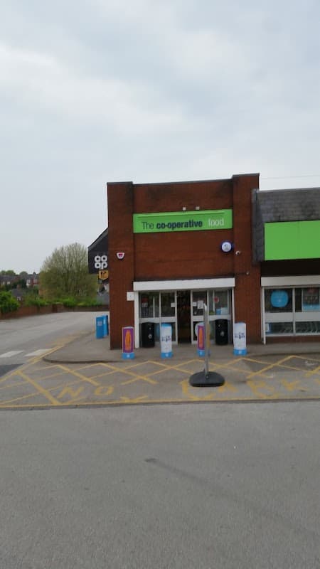 Co-op Food store exterior with green signage, parking area, and nearby trees in Kilnhurst, Yorkshire.
