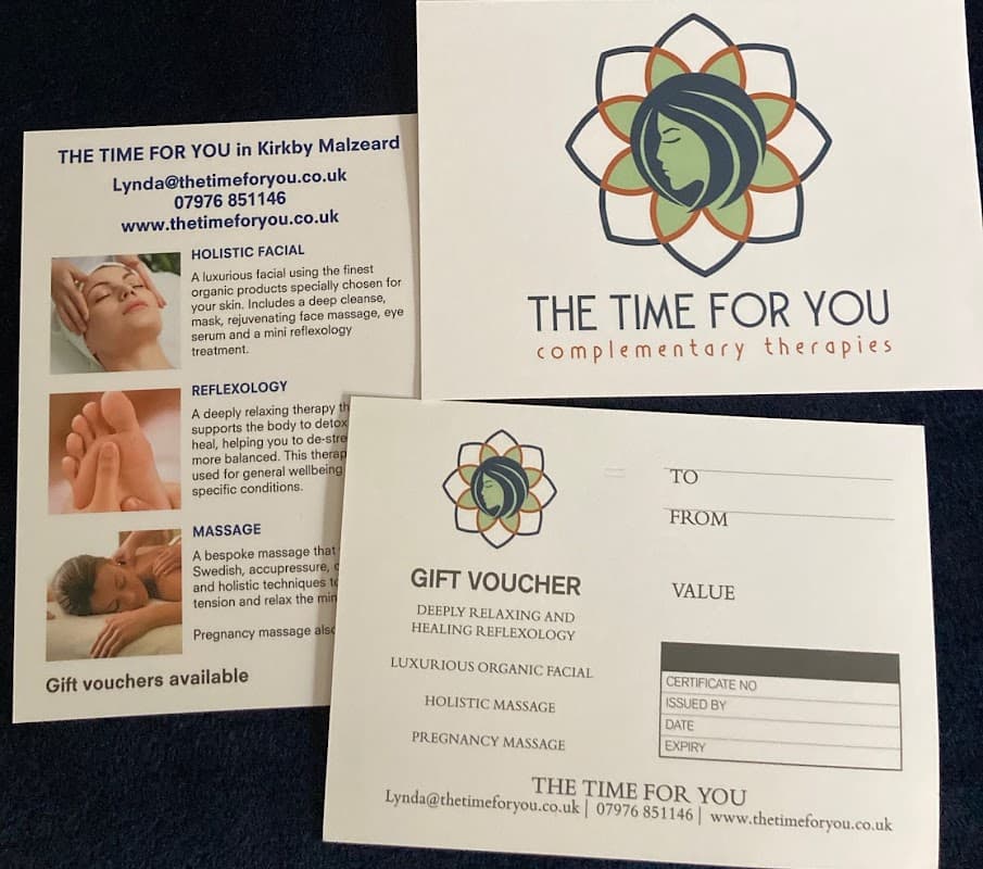 Brochures for "The Time For You" offering holistic therapies like facials, reflexology, and massage with gift vouchers.