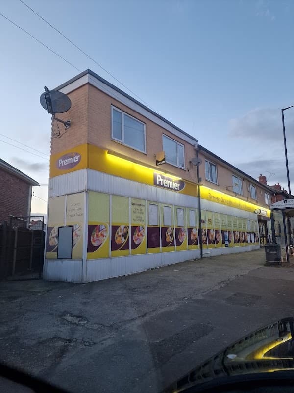 Premier-branded convenience store with large windows displaying food options, located in Maltby, Yorkshire.