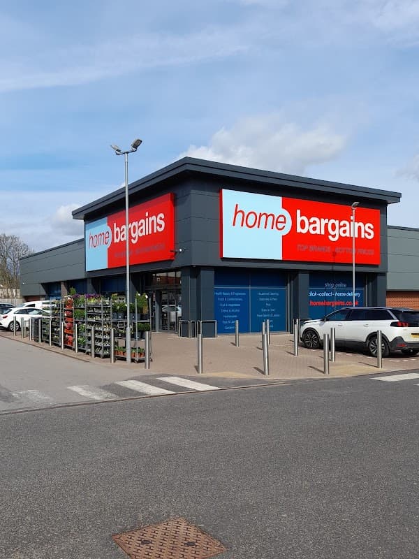 Home Bargains store exterior with large signage, parking area, and shopping trolleys outside in Maltby, Yorkshire.