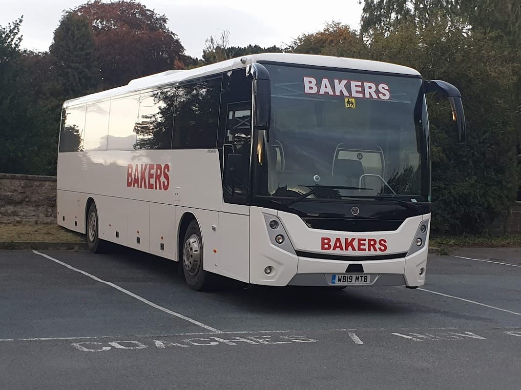 Bakers-branded coach parked in Wentworth Street Car Park, with "COACHES / MIN" signage visible.