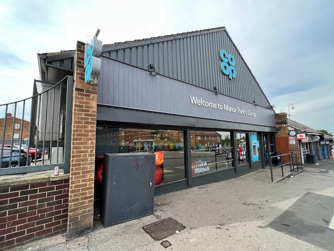 Welcome to Manor Park Co-op, featuring a modern storefront and large windows displaying products inside.