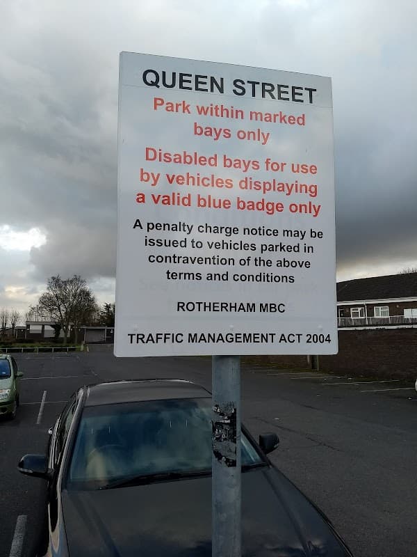 Sign at Queen Street Car Park in Mexborough, detailing parking regulations and disabled bay usage.