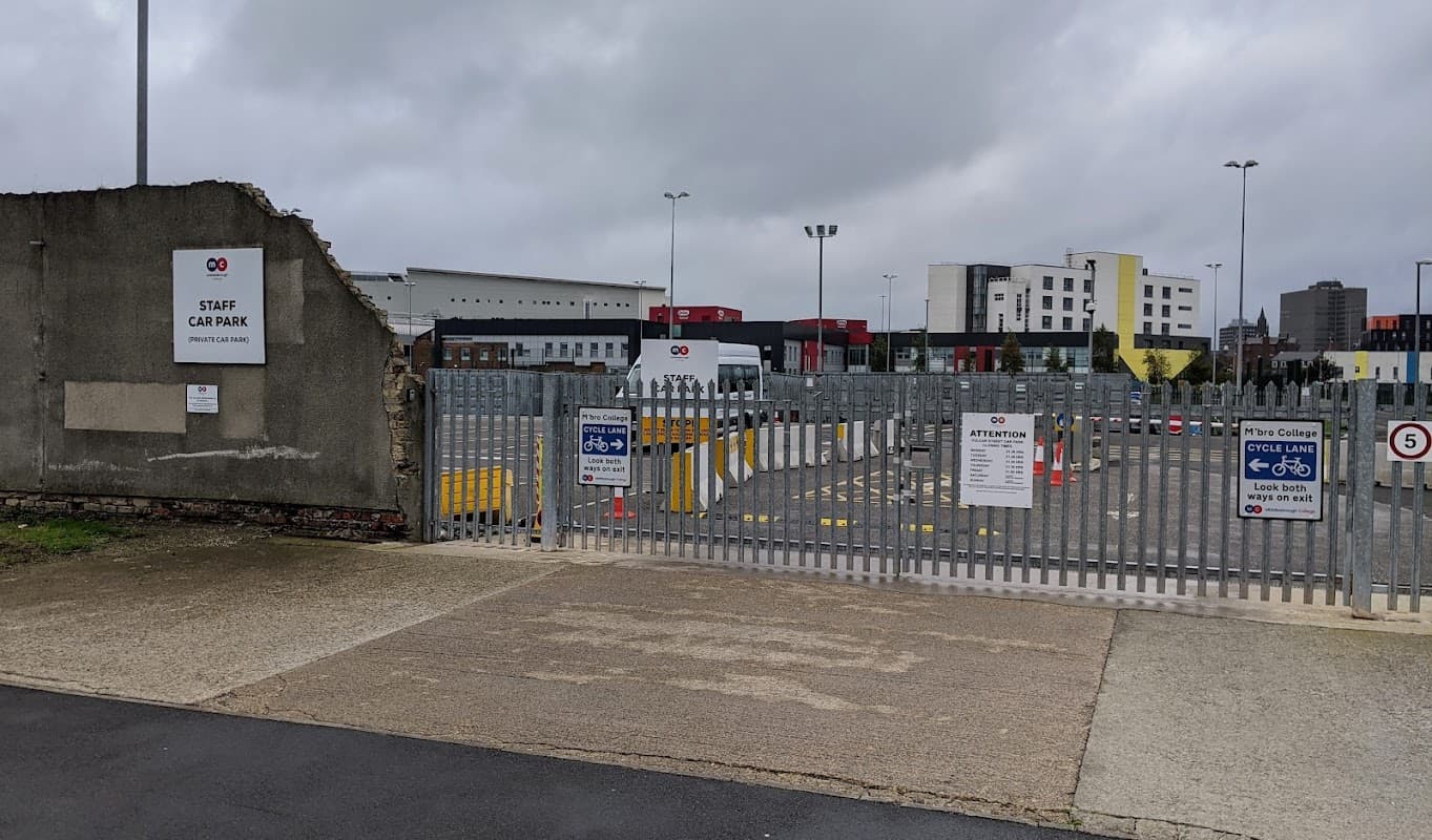 Staff-only car park with a gated entrance, signage, and marked parking spaces in Middlesbrough, Yorkshire.