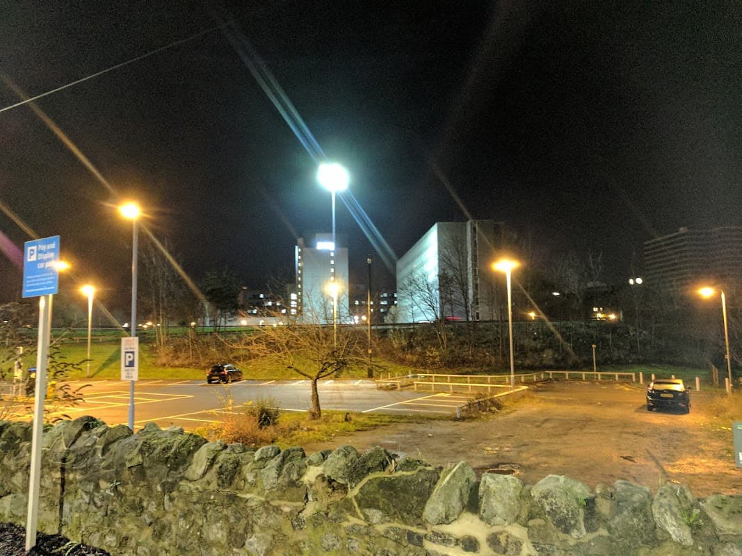 Wood Street Car Park at night, featuring illuminated parking spaces and nearby buildings in Middlesbrough, Yorkshire.