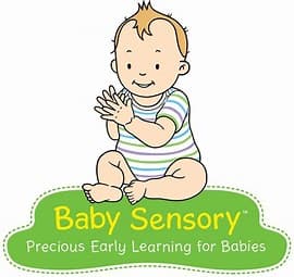 Cartoon baby clapping hands, wearing a striped onesie, with "Baby Sensory" logo and tagline below.