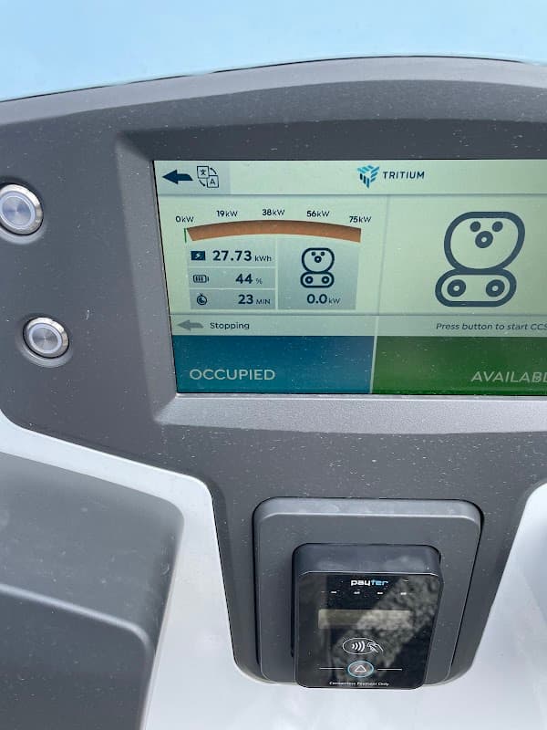 Zest Charging Station display showing charging status, power levels, and time remaining for an electric vehicle.