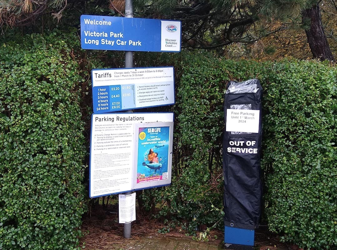 Welcome sign for Victoria Park Long Stay Car Park, with tariff details and a notice for out-of-service payment machine.