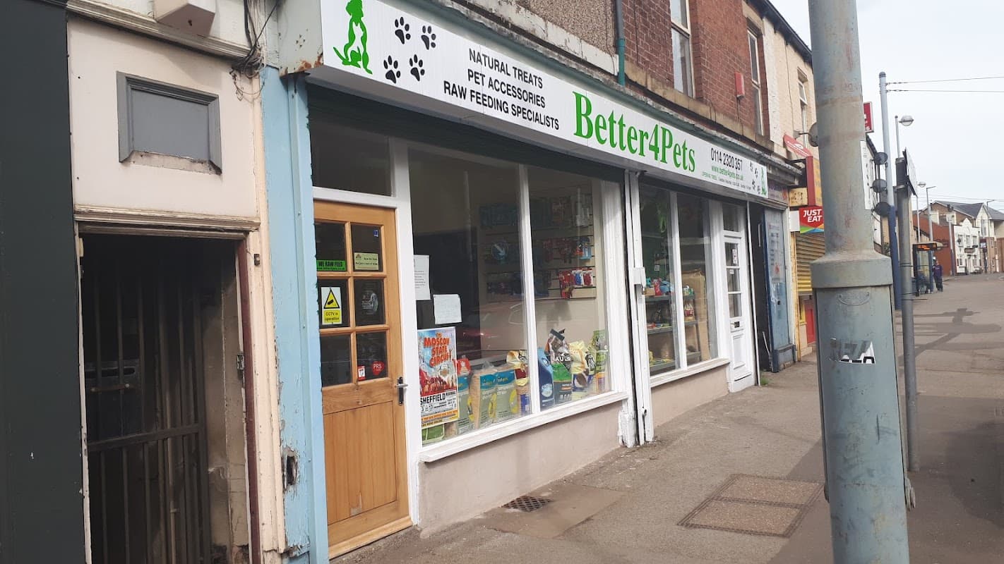 Pet shop exterior with large windows displaying pet supplies and treats, located on a street in Sheffield, Yorkshire.