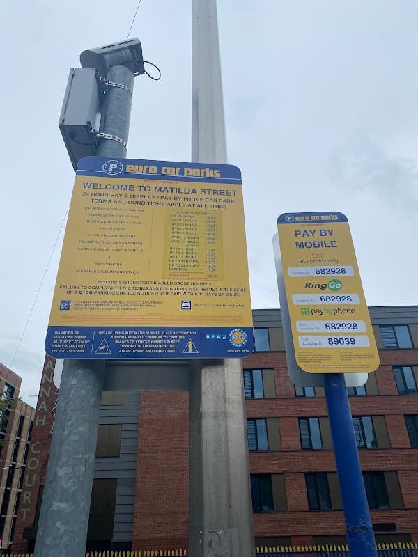 Welcome sign for Matilda Street Car Park with payment instructions and mobile payment options in Sheffield, Yorkshire.