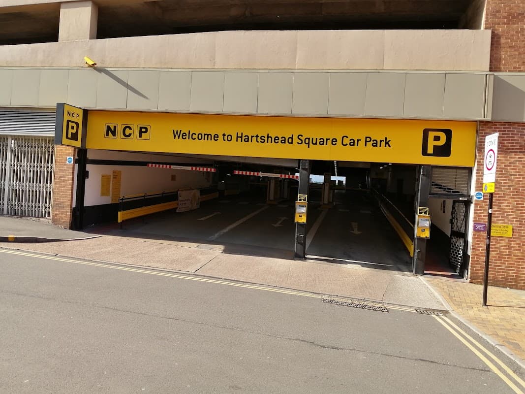 NCP Hartshead Square Car Park entrance with yellow signage and payment machines visible.