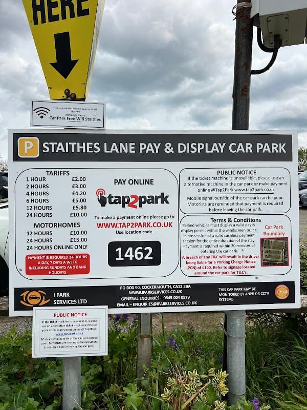 Signage for Staithes Lane Pay & Display Car Park with parking tariffs and payment instructions for tap2park.