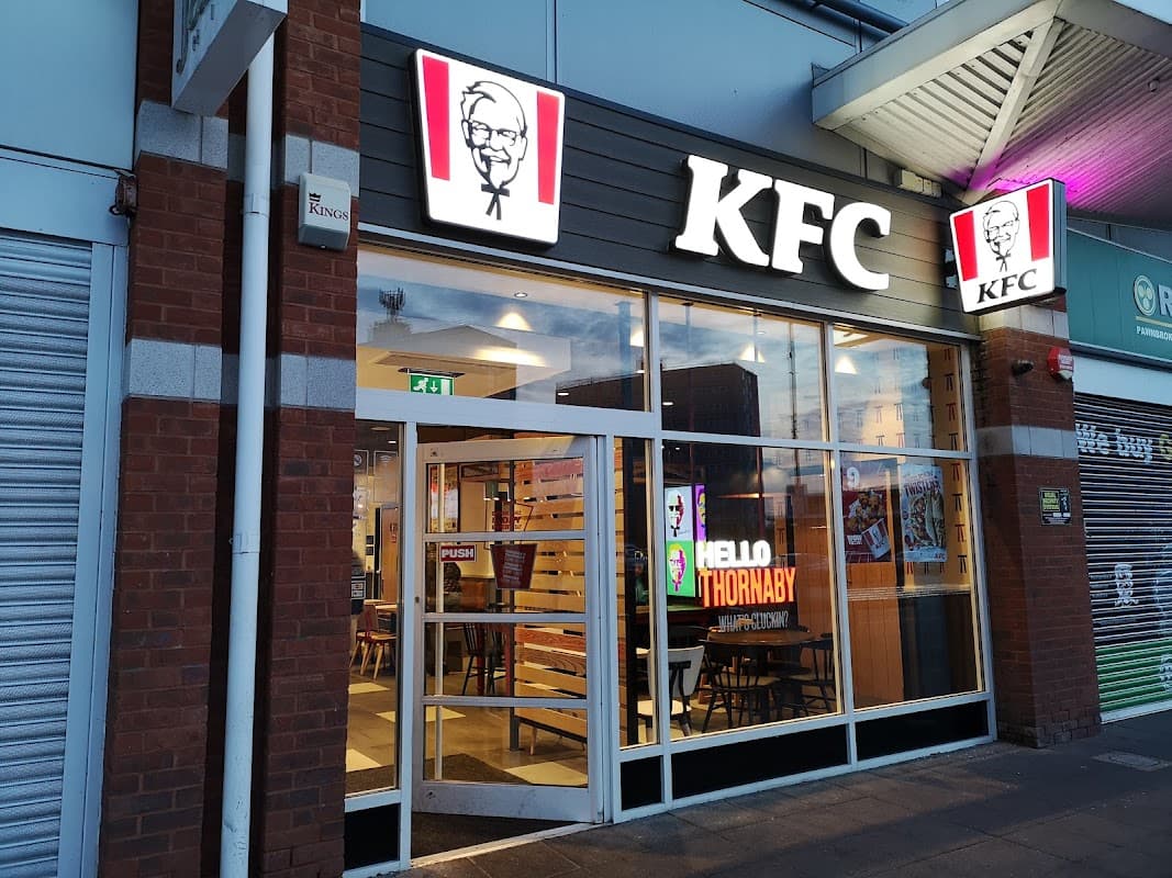 KFC storefront in Pavilion Shopping Centre, Thornaby, featuring bright signage and a welcoming entrance.