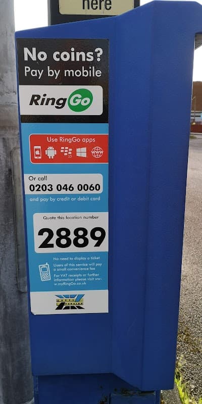 Blue payment machine for mobile parking, featuring instructions for RingGo app and contact details. Location number 2889.