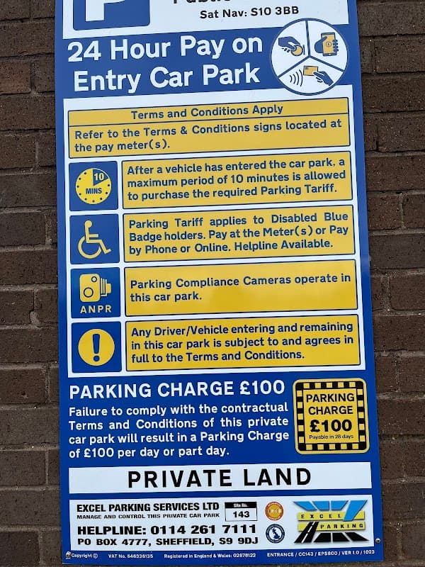 Sign detailing parking rules and charges at Broomhill Shops Rooftop Car Park in Walkley, Yorkshire.