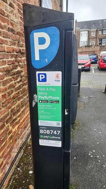Parking meter with "P" sign and payment instructions for Bootham Row Car Park in York, Yorkshire.