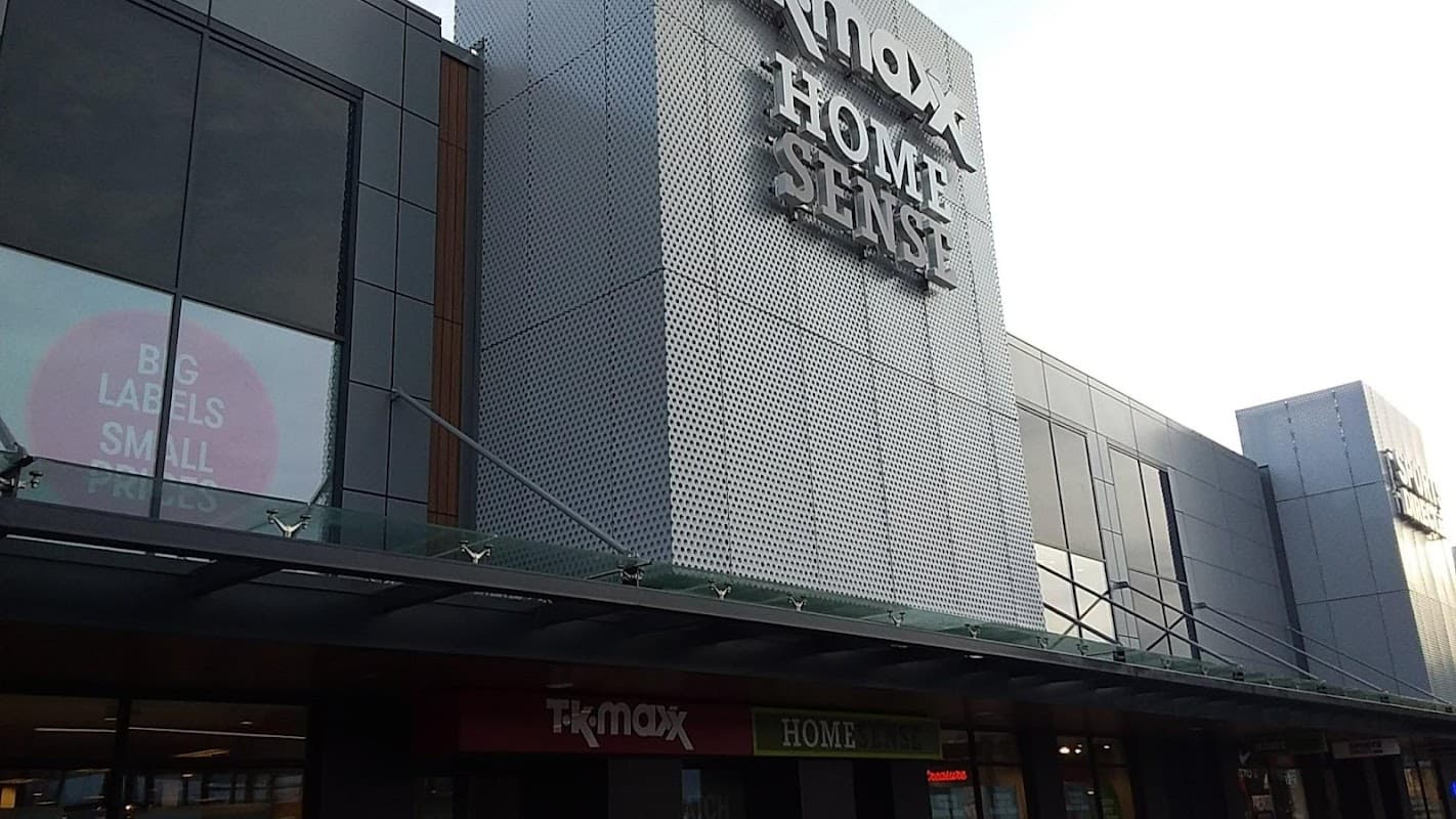 Modern storefront of Homesense in York, featuring large signage and a sleek architectural design.