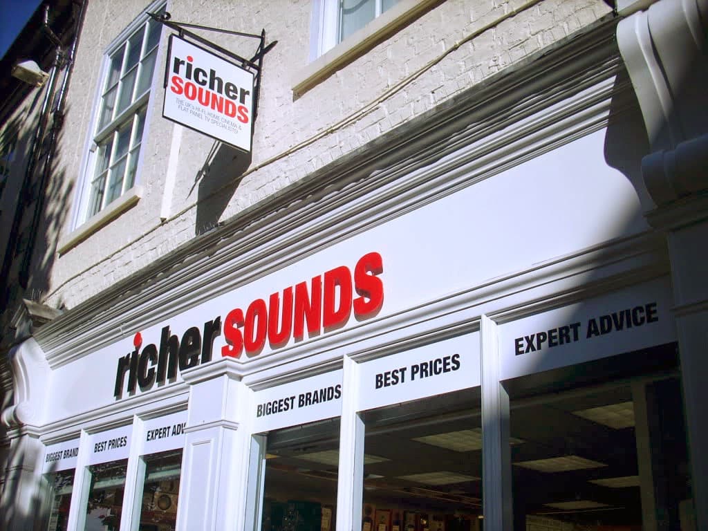Richer Sounds storefront in York, featuring a prominent sign and windows displaying "Best Prices" and "Expert Advice."