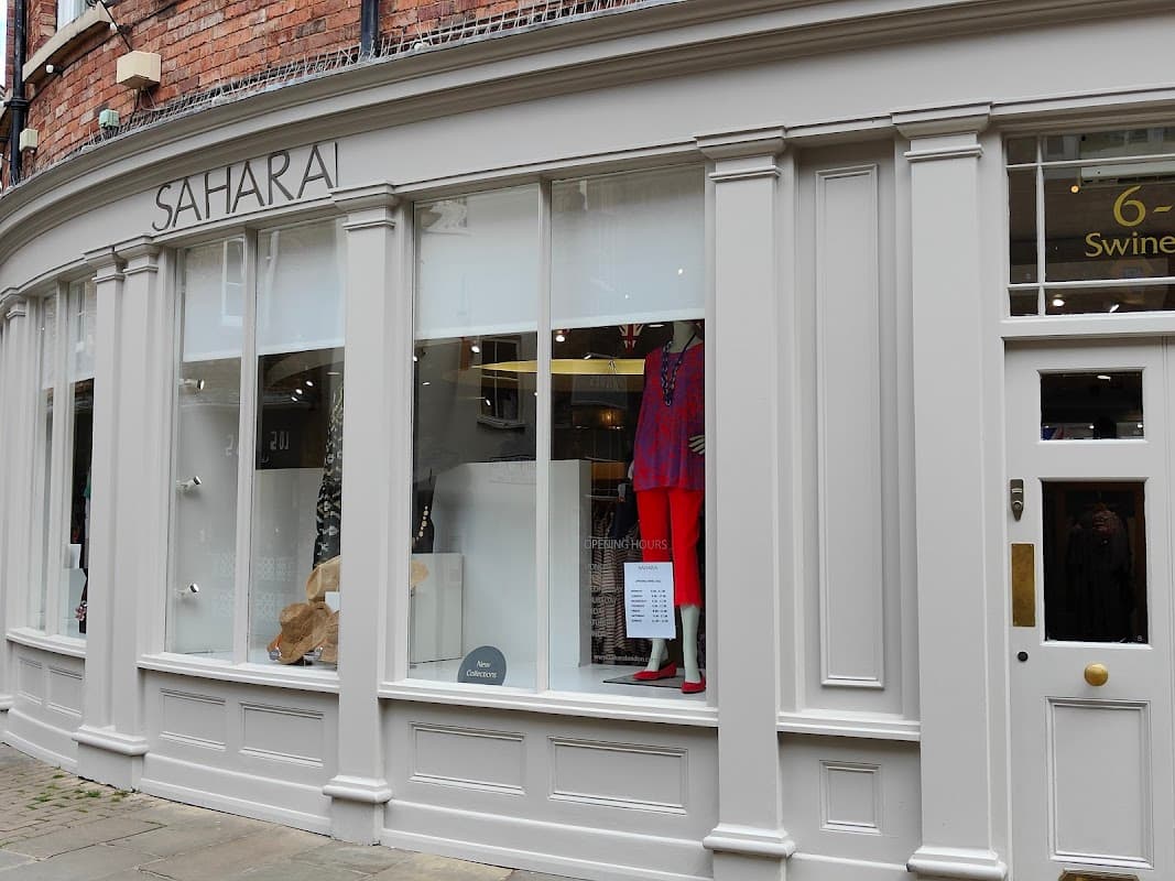 Sahara Boutique storefront featuring stylish clothing displays and a welcoming entrance in York, Yorkshire.