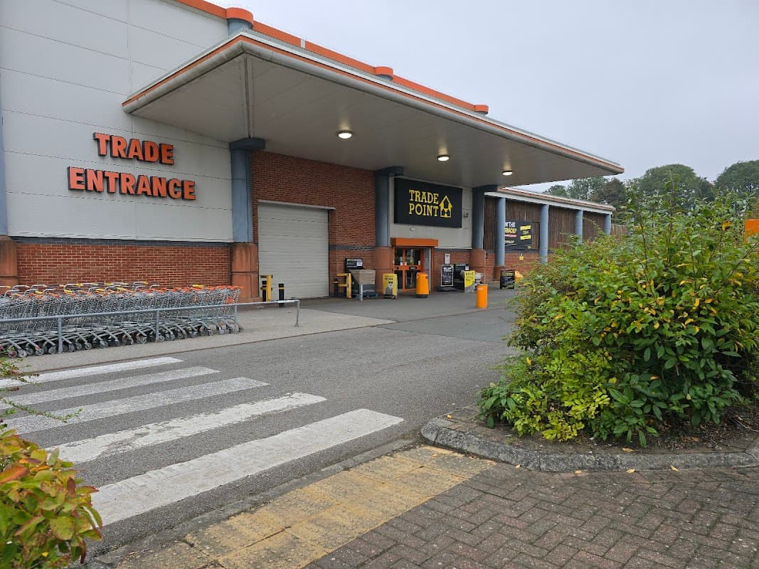 TradePoint York entrance with shopping carts, signage, and a landscaped area in front.