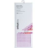 Cricut Joy Deluxe Paper pack with floral and geometric patterns in pink and purple, 10 sheets.