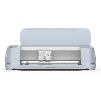 Cricut Maker 3 Electronic cutting machine in light blue with open lid and visible cutting blade.