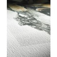 Hahnemühle German Etching Art paper, textured surface, white with subtle gray and beige watercolor patterns.