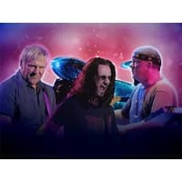 Three musicians performing with a cosmic background, featuring a guitar, keyboard, and vibrant lighting effects.